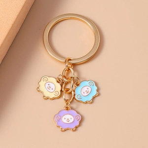 Porte-clés de moutons de dessin animé mignon avec trois agneaux en émail colorés