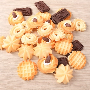 Detailed macro view of realistic resin food pendants for DIY jewelry crafting