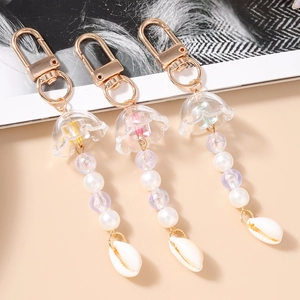 Ozean-Stil Künstliche Perlen Schlüsselanhänger Künstliche Perle Naturmuschel Harz Blume Anhänger Tasche Charme Gold Legierung Schmuck