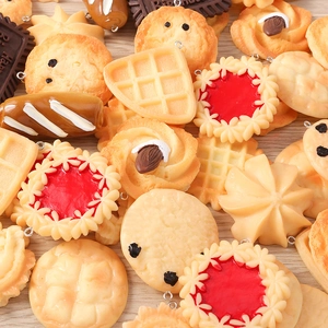 Detailed view of realistic resin food charms with metal loops for DIY jewelry making