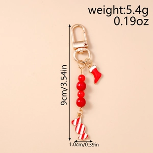Porte-clés de Noël avec perles rouges, pendentifs bonbons et chaussettes sur fermoir doré