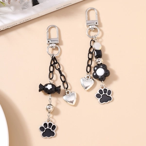 Portachiavi creativo bianco e nero con ciondoli a zampa di gatto e fiori per borse