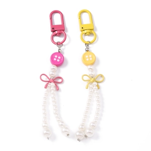 Porte-clés en perles à la mode avec des nœuds et des boutons colorés rose et jaune