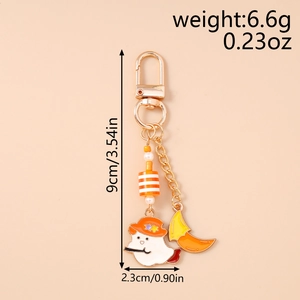 Ghost keychain with orange hat, moon pendant, and striped beads, 3.54in total length