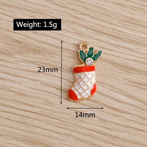Detailed view of enamel Christmas sock charm with dimensions and weight specs