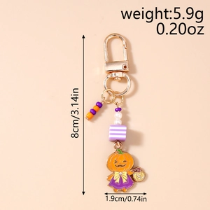 Détail d'un porte-clés citrouille d'Halloween avec perles violettes et hauteur de 8cm
