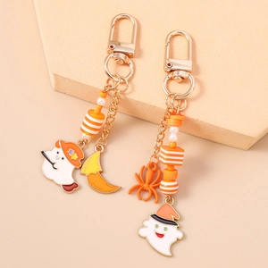 Creative Halloween keychain set with ghost witch hat and spider pendant on gold alloy chain