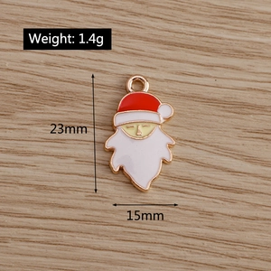 Detail view of 23x15mm Santa Claus enamel charm for Christmas jewelry making
