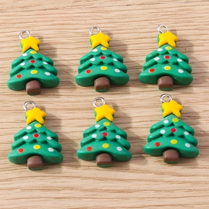 Detail of DIY Christmas tree pendants with colorful dots and silver hanging rings