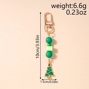 Detailed view of green Christmas tree keychain with size and weight measurements