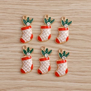 Detail view of 6 red and white checkered Christmas sock pendants with small rhinestones