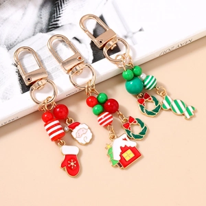 Set de porte-clés de Noël avec pendentifs Père Noël et perles rayées colorées