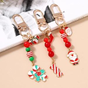 Set de porte-clés de Noël avec Père Noël, canne à sucre et perles colorées sur alliage