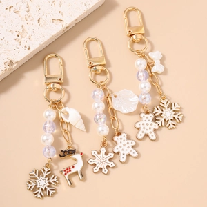 Weihnachts-Schneemann und Elch Schlüsselanhänger-Set mit Perlen und Muscheln