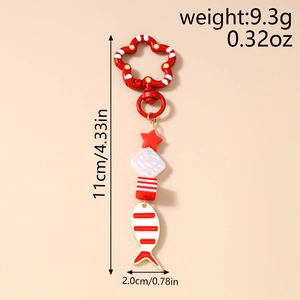 Detail showing dimensions of the red and white fish keychain with star and diamond beads
