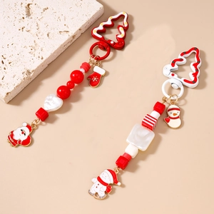 Christmas beaded keychains with Santa and snowman charms in red and white festive theme