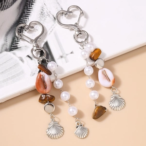 Porte-clés à Pampilles en Coquillage Style Bohème Pierre Naturelle Fausse Künstliche Perle Anneau de Clé en Métal en Forme de Cœur Femme