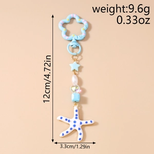 Blauwe zeester sleutelhanger met bloemsluiting en details over 12 cm lengte