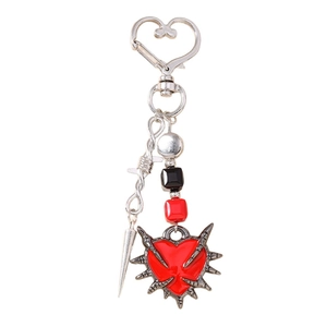 Gothic thorns heart keychain with sword spike and red heart pendant on white background