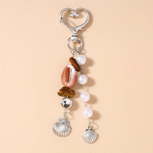 Détails du porte-clés bohème avec coquillages, perles et pierres naturelles