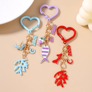 Fashion 2026 letter keychain with metal sea fish dolphin charms and heart clip hooks