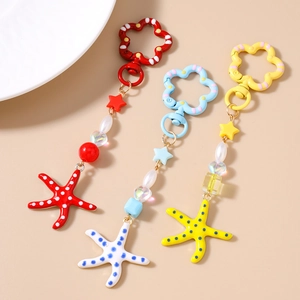 Zeester sleutelhangers met kralen in rood, blauw en geel voor dames tassen