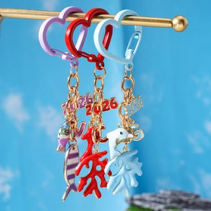 Detail of 3pcs ocean theme keychains with 2026 charms and colorful sea animal pendants