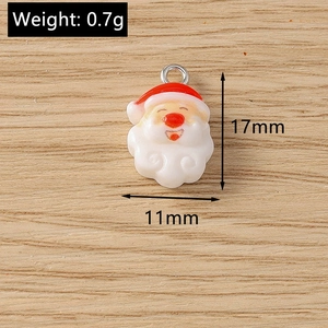 Detailed view of Santa Claus resin pendant with dimensions 17mm x 11mm for jewelry DIY