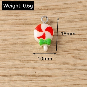 Lollipop charm with red white stripes and green bow for DIY holiday jewelry crafts
