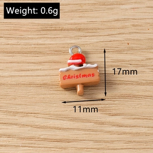 Detailed view of Christmas signpost resin charm with Santa hat and 17x11mm size info