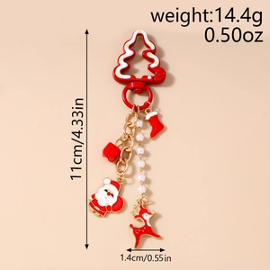 Detailed Christmas keychain with Santa, reindeer, and socks charms on a gold chain