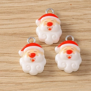 Three cartoon Santa Claus resin pendants with metal rings for DIY jewelry making