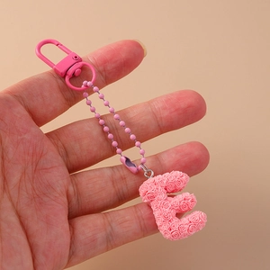 Pink floral letter E keychain with resin roses and matching pink lobster clasp for bags