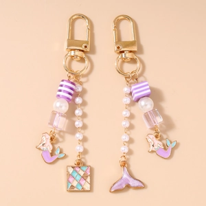 Porte-clés de Mode Sirène Queue de Poisson Gland pour Femmes Künstliche Perles Rayées Violettes Émail Charme Géométrique Sac Pendentif