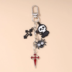 Detailed view of Gothic Halloween keychain with spider, grim reaper, and cross charms