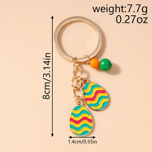 Detailed view of colorful enamel Easter egg keychain with dimensions and weight info