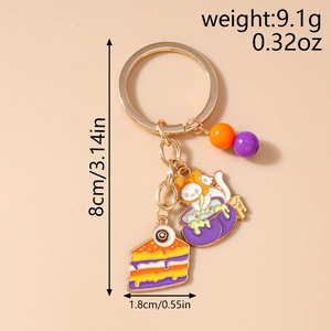 Detail of Halloween keychain with cartoon cat in cauldron, cake, and size measurements