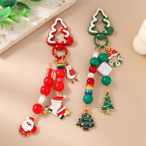 Porte-clés de Noël avec perles et pendentifs Père Noël et sapin en rouge et vert