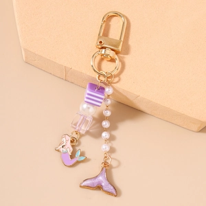 Détails du porte-clés sirène violet avec perles et mousqueton en alliage doré élégant