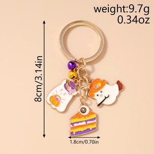 Detail view of Halloween ghost and cake keychain charm with dimensions and weight info