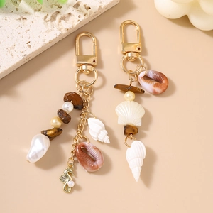 Starfish and seashell beaded keychains with tiger eye stone and golden sea horse charms