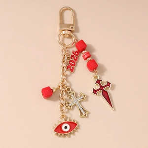 Gothic Halloween keychain with evil eye, cross, bat, ghost charms and 2026 red pendant
