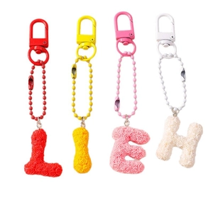 Floral textured resin letter keychains L I E H with rose pattern and metal hooks