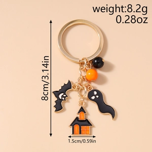Detail view of Halloween keychain with bat and ghost charms showing 8cm total length