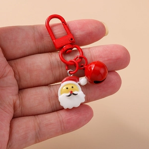 Christmas keychain with Santa Claus pendant, red metal lobster clasp and small bell