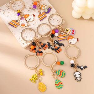 Halloween metal keychains with spooky charms like ghosts and pumpkins for gift