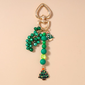 Christmas beaded keychain with green bells and festive tree pendants on gold heart hook