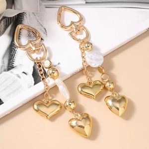 Porte-clés cœur doré élégant avec perle baroque et pendentif à chaîne longue stylé