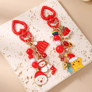 Christmas keychain set with Santa, snowman and bell charms on white stone base