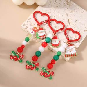 Christmas beaded keychain set with Santa Claus and candy pendants in red and green colors